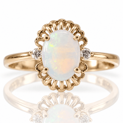 10K Yellow Gold Oval Opal & Diamond Accent Ring
Gold & Silver Pawn Shop