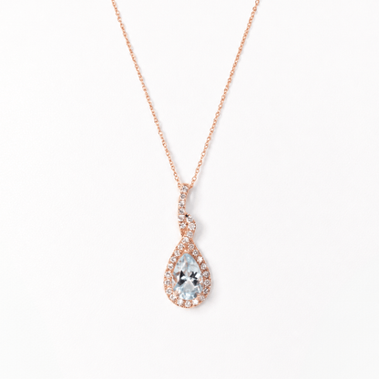 14K Rose Gold Aquamarine & Diamond Teardrop Halo Pendant
Gold & Silver Pawn Shop