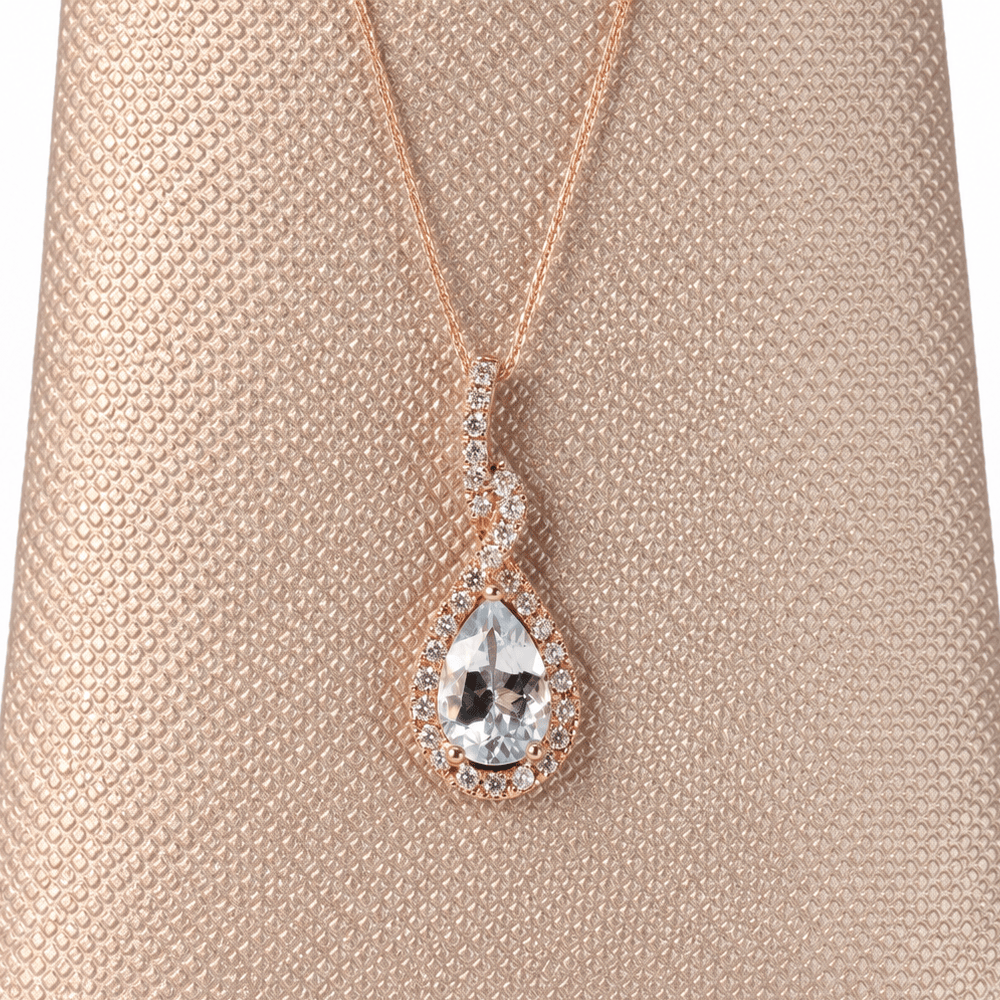 14K Rose Gold Aquamarine & Diamond Teardrop Halo Pendant
Gold & Silver Pawn Shop