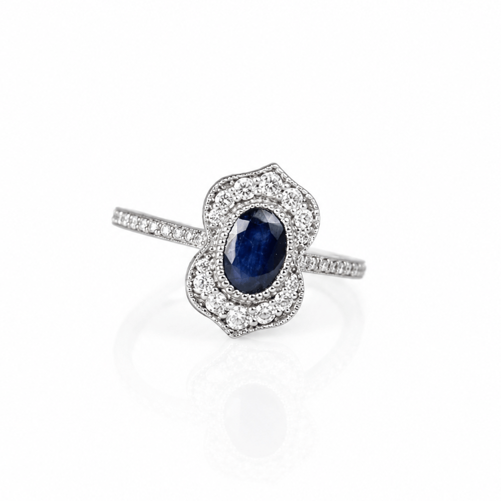 14K White Gold Sapphire & Diamond Halo Ring
Gold & Silver Pawn Shop