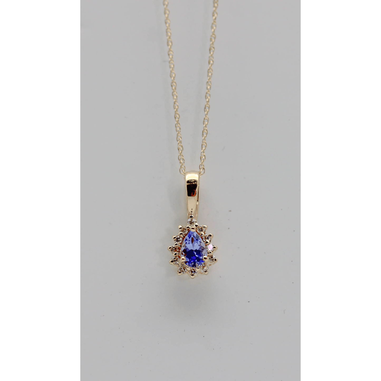 14K Yellow Gold 1.8G Purple Stone Necklace