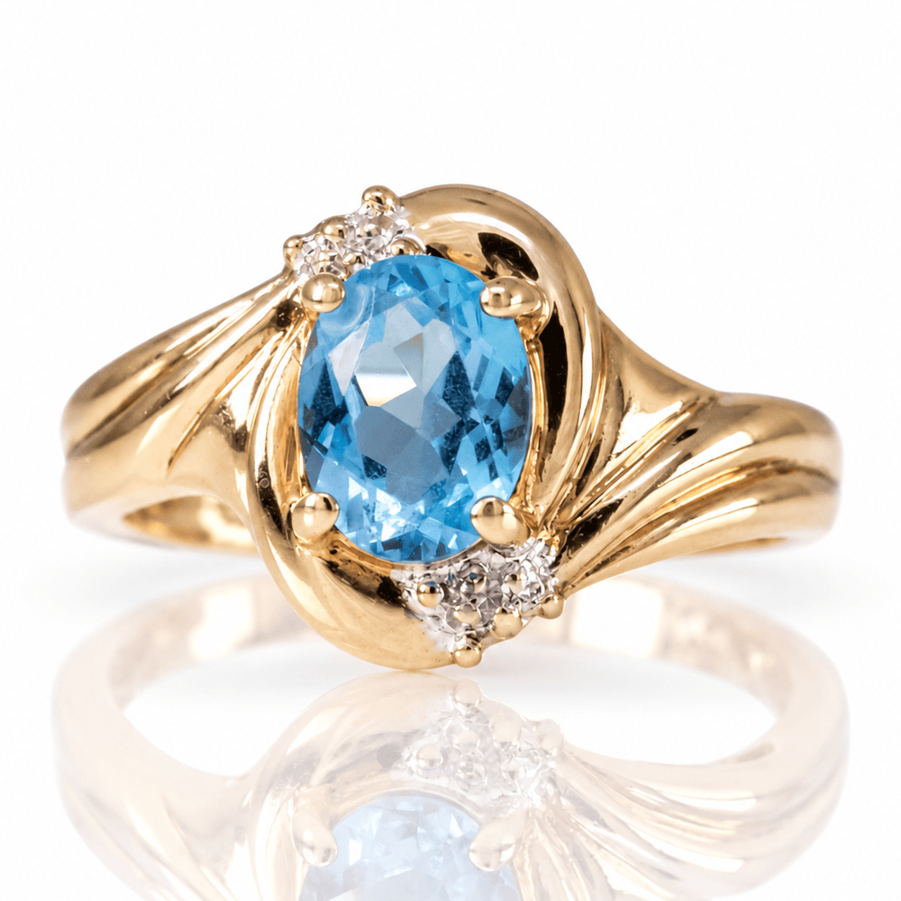 14K Yellow Gold Blue Gemstone & Diamond Accent Ring
Gold & Silver Pawn Shop