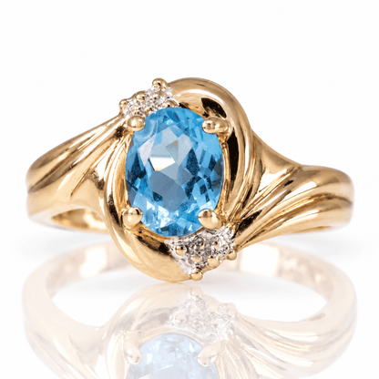 14K Yellow Gold Blue Gemstone & Diamond Accent Ring
Gold & Silver Pawn Shop