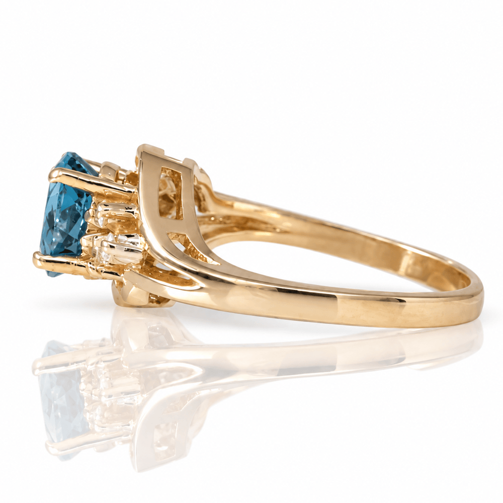 14K Yellow Gold Blue Gemstone & Diamond Accent Ring
Gold & Silver Pawn Shop