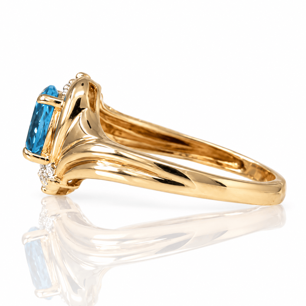 14K Yellow Gold Blue Gemstone & Diamond Accent Ring
Gold & Silver Pawn Shop