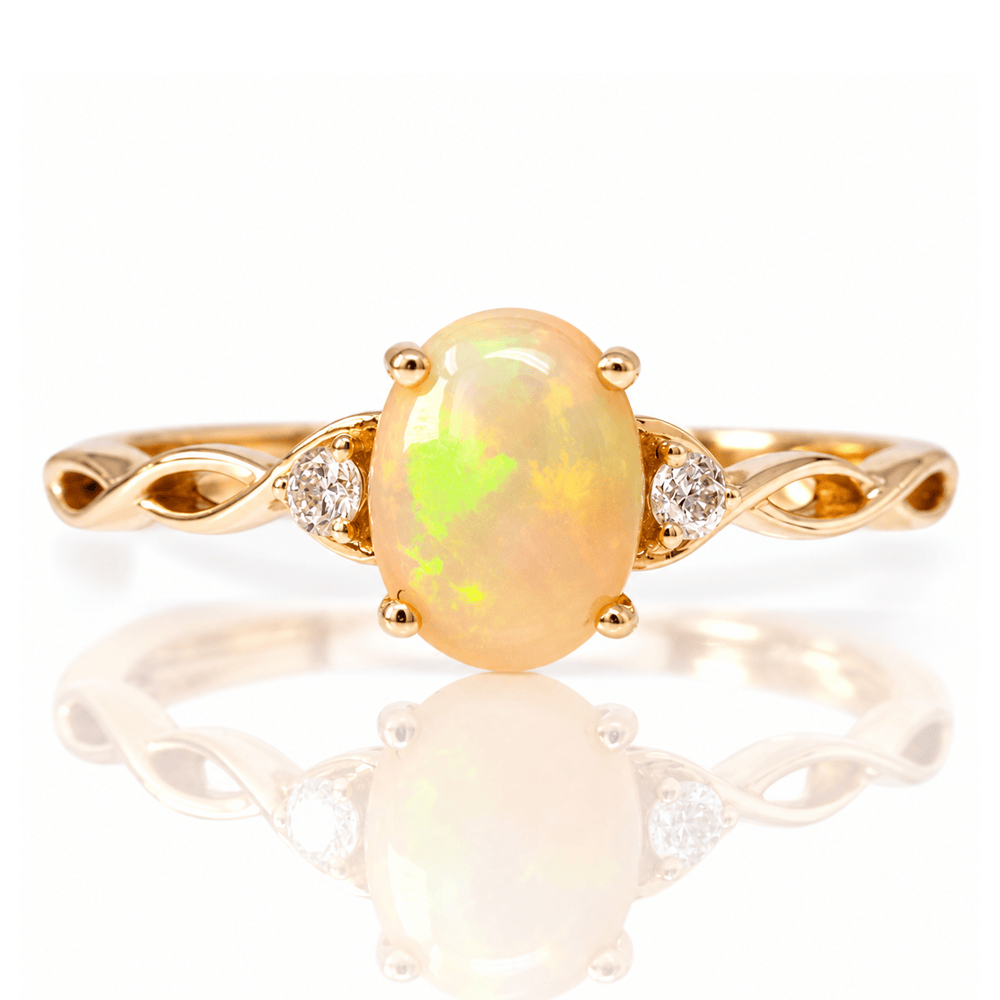 14K Yellow Gold Oval Opal & Diamond Accent Twist Ring
Gold & Silver Pawn Shop