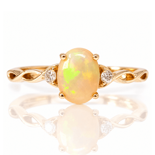 14K Yellow Gold Oval Opal & Diamond Accent Twist Ring
Gold & Silver Pawn Shop