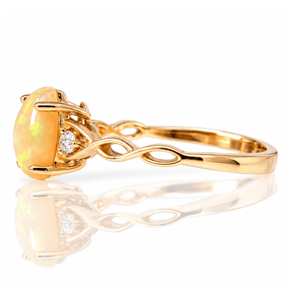14K Yellow Gold Oval Opal & Diamond Accent Twist Ring
Gold & Silver Pawn Shop