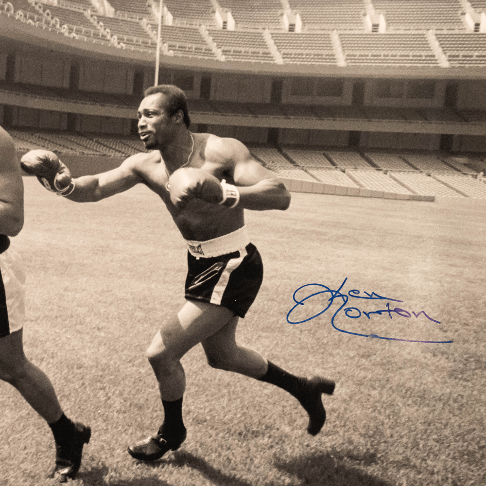 Muhammad Ali and Ken Norton Signed Photo
Gold & Silver Pawn Shop