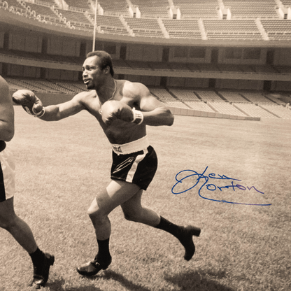 Muhammad Ali and Ken Norton Signed Photo
Gold & Silver Pawn Shop