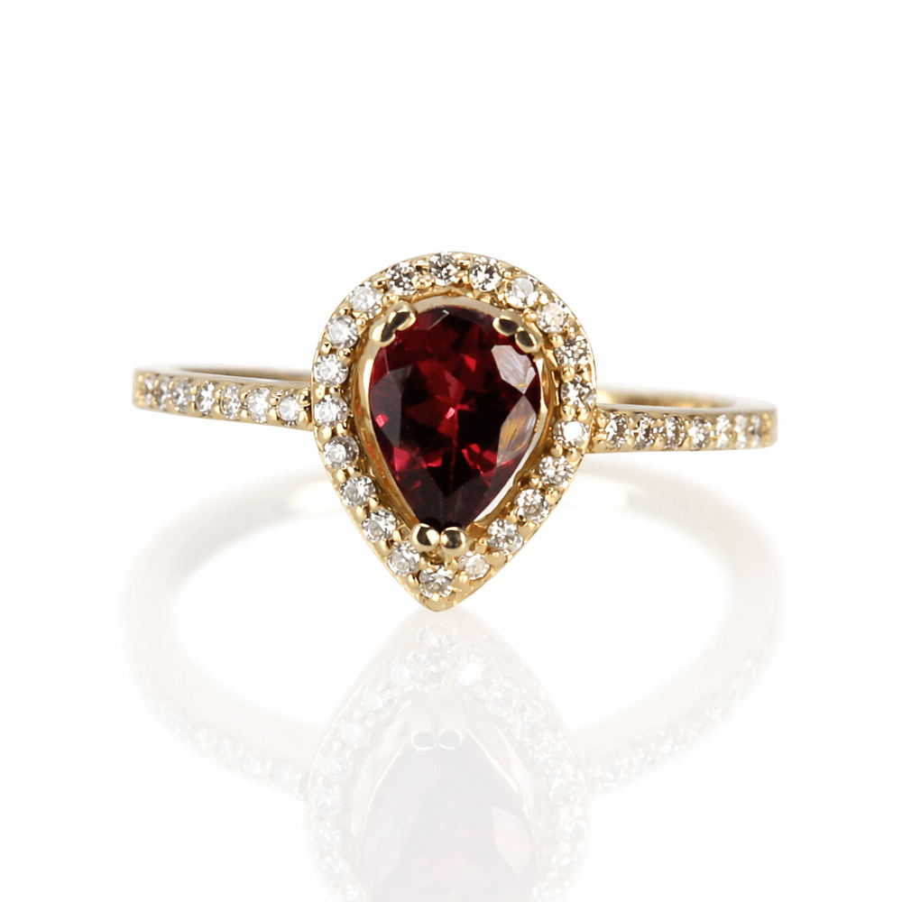 14K Yellow Gold Pear-Cut Tourmaline & Diamond Halo Ring
Gold & Silver Pawn Shop