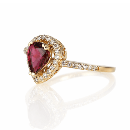 14K Yellow Gold Pear-Cut Tourmaline & Diamond Halo Ring
Gold & Silver Pawn Shop