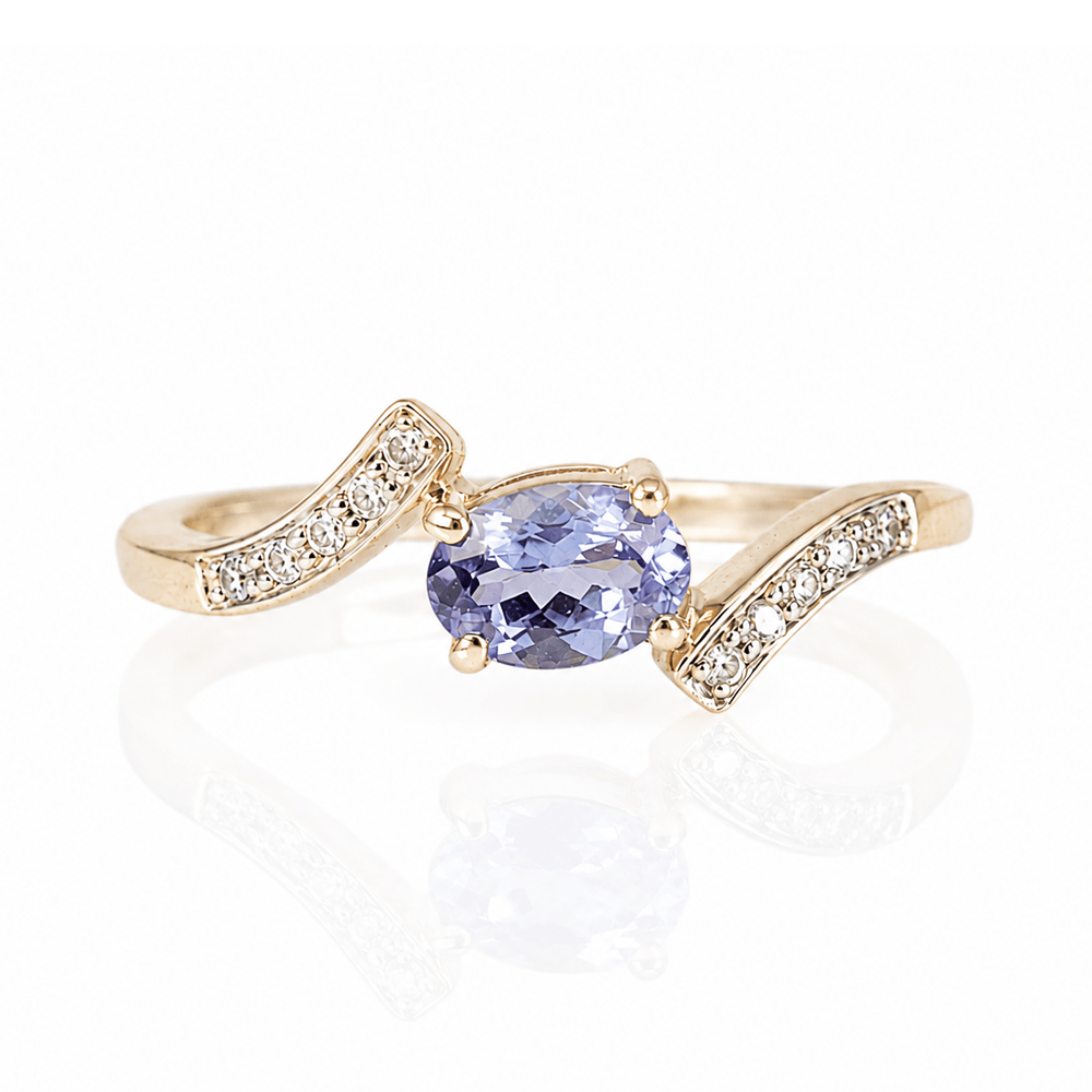 10K Yellow Gold Tanzanite & Diamond Bypass Ring
Gold & Silver Pawn Shop