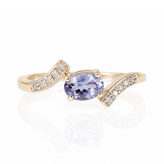 10K Yellow Gold Tanzanite & Diamond Bypass Ring
Gold & Silver Pawn Shop