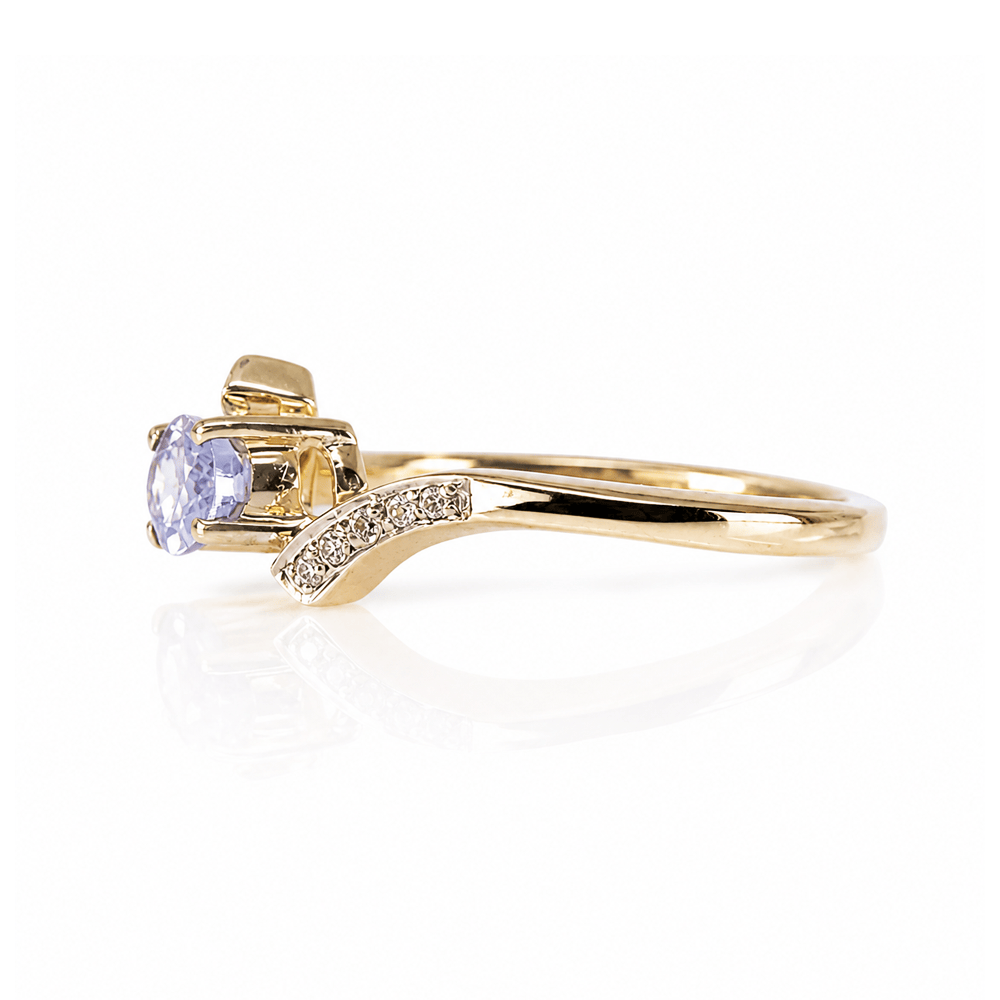 10K Yellow Gold Tanzanite & Diamond Bypass Ring
Gold & Silver Pawn Shop