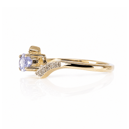10K Yellow Gold Tanzanite & Diamond Bypass Ring
Gold & Silver Pawn Shop