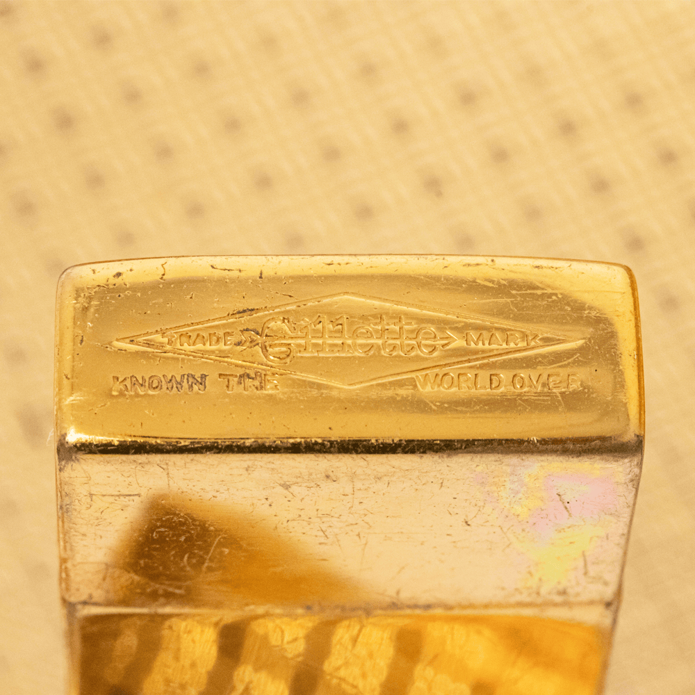 Vintage Evans Gold-Tone Cigarette & Makeup Compact Case
Gold & Silver Pawn Shop
