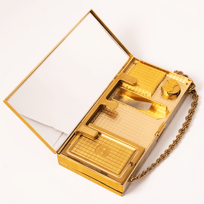 Vintage Evans Gold-Tone Cigarette & Makeup Compact Case
Gold & Silver Pawn Shop