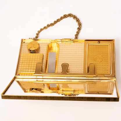 Vintage Evans Gold-Tone Cigarette & Makeup Compact Case
Gold & Silver Pawn Shop