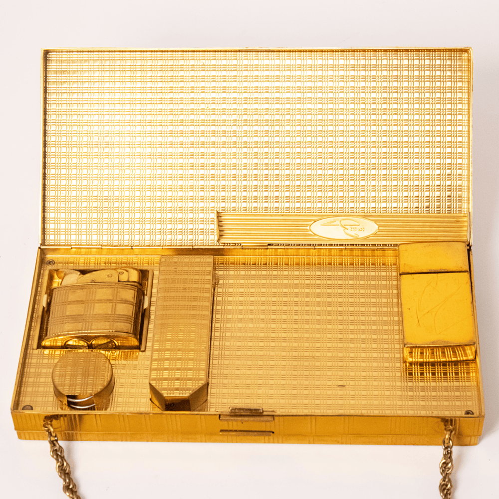 Vintage Evans Gold-Tone Cigarette & Makeup Compact Case
Gold & Silver Pawn Shop