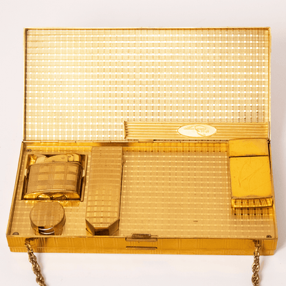Vintage Evans Gold-Tone Cigarette & Makeup Compact Case
Gold & Silver Pawn Shop