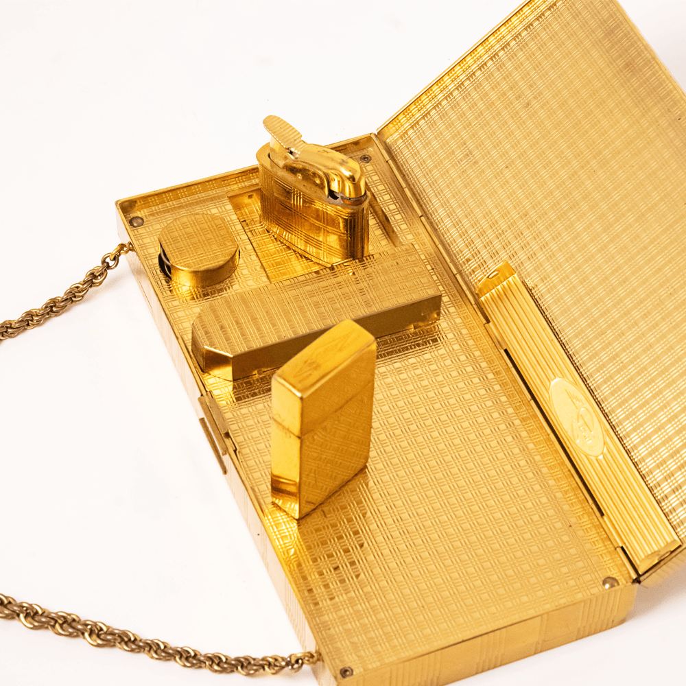 Vintage Evans Gold-Tone Cigarette & Makeup Compact Case
Gold & Silver Pawn Shop